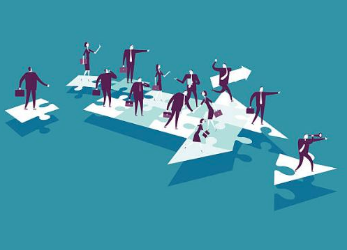 Different people standing over unresolved puzzle of an arrow symbol